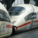 High-speed ICE train departing Munich Central Station under new 2026 timetable