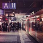 Passengers waiting at a German train station during cancellations between Hamburg and Berlin