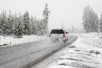 Snowfall covering an Alpine pass as Germany braces for frost in early October