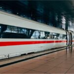 ICE train leaving Munich central station after Deutsche Bahn timetable change