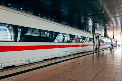 ICE train leaving Munich central station after Deutsche Bahn timetable change