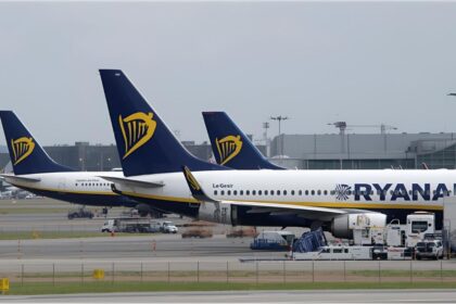 Parked airplanes at a German airport as airlines cut routes and reduce capacity