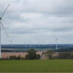 Wind turbines in calm weather under grey October sky in Germany