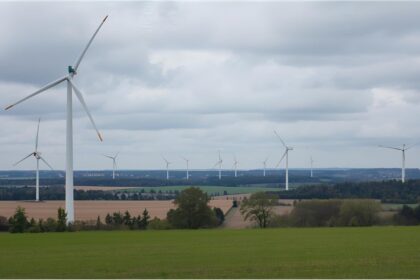 Wind turbines in calm weather under grey October sky in Germany