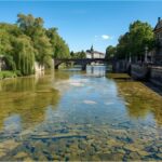 Low water level of the Isar River near Praterinsel in Munich during maintenance works.