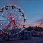 Ferris wheel and market stalls at Munich’s Kirchweihdult on Mariahilfplatz
