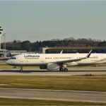 Lufthansa airplane on the runway at Munich Airport as airline reduces domestic routes.