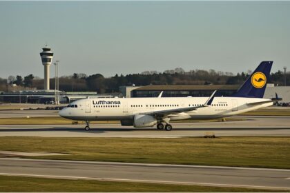 Lufthansa airplane on the runway at Munich Airport as airline reduces domestic routes.