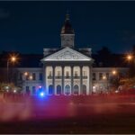 Police and paramedics at a Munich university building after a student’s fall from the second floor.