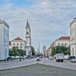 Derailed tram surrounded by emergency vehicles near Schwabinger Tor in Munich