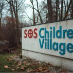 Entrance sign of SOS Children’s Villages Germany following abuse allegations