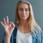 Young employees in a German office showing contrast between flexible work and long-hour pressure.