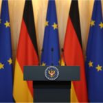 German government podium symbolizing discussions on Syria deportation policy