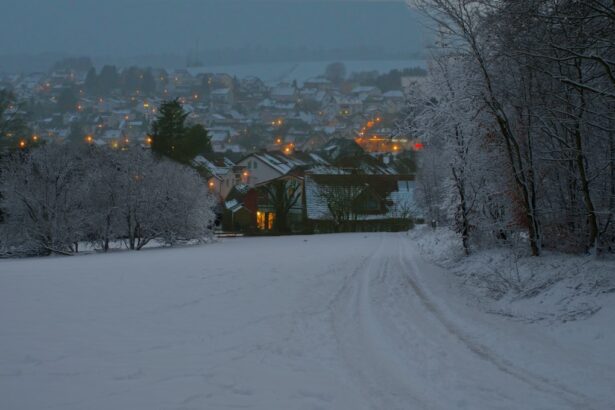 Light snowfall and icy road conditions in a German upland region during early winter.