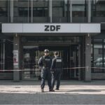 Police secure the ZDF capital studio in Berlin after a protest incident